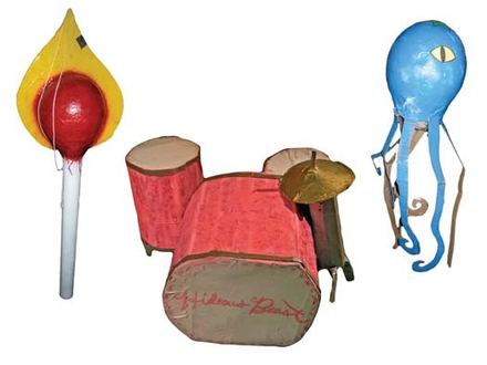 Finished piñatas: a lollipop, a drum kit and an octopus